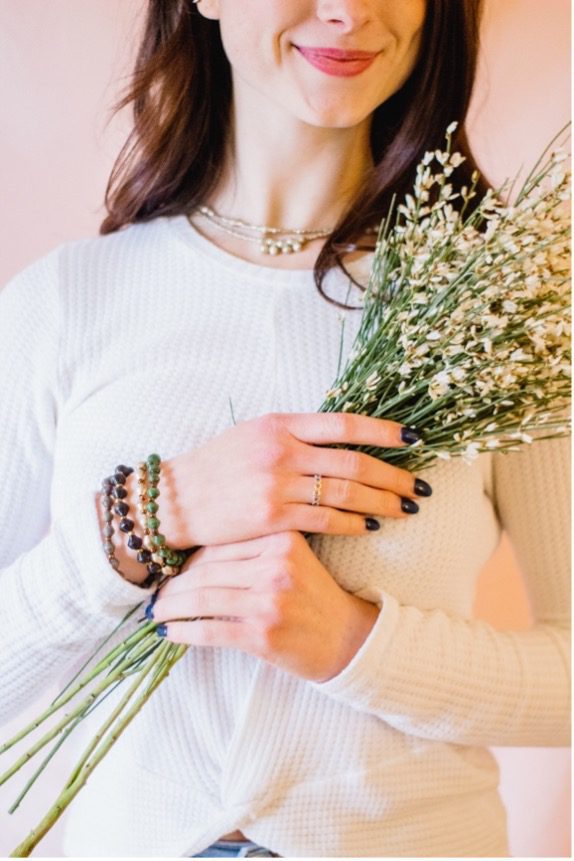 Adera Designs Woman holding Flowers